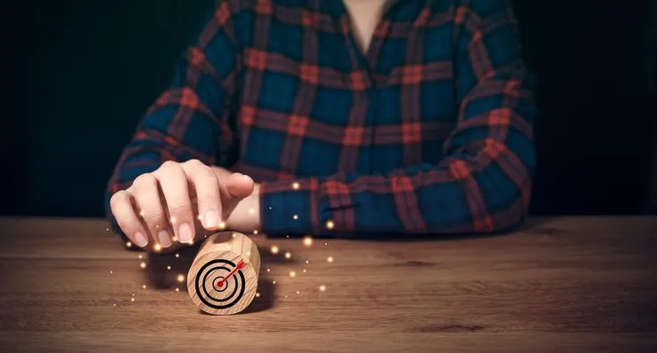 business-achievement-goal-objective-target-concepts-target-icon-round-wooden-block-pointing-by-businessman-hand-marketing-plan-business